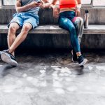 Stocksy-Lumina-Man-and-Woman-in-Sportswear-Sitting-and-Chatting